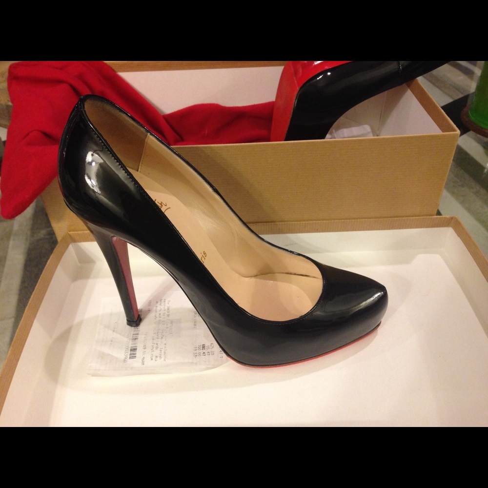 Like new Christian Louboutin black heels.